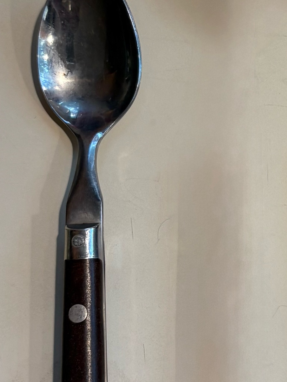 Washington Forge stainless spoon with brown handle rivets Korea Vintage